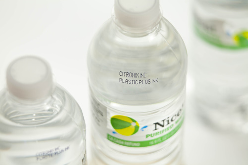 CIJ on PET Code-on-Water-Bottles Edit Printers for beverage coding